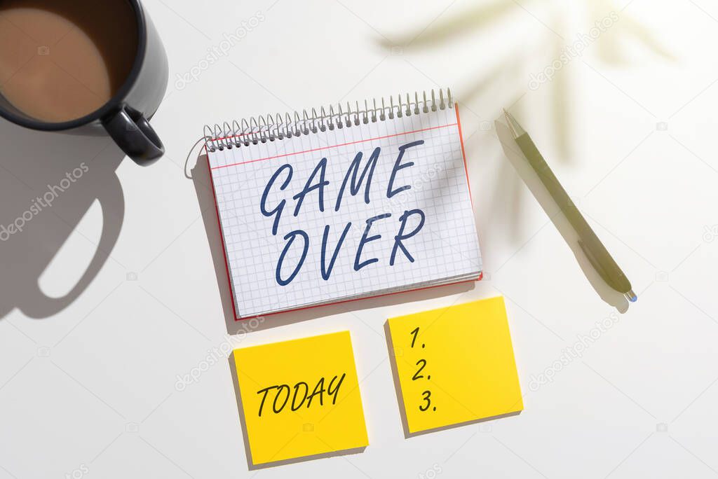 Hand writing sign Game Over, Business overview A situation in a particular sport that reach his finals or ending Two colleagues shaking hands congratulating successful teamwork.
