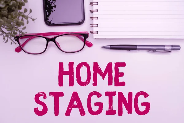 Handwriting text Home Staging, Business overview Act of preparing a private residence for sale in the market Office Supplies Over Desk With Keyboard And Glasses And Coffee Cup For Working