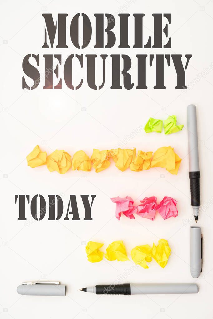Handwriting text Mobile Security, Internet Concept Protection of mobile phone from threats and vulnerabilities Multiple Assorted Collection Office Stationery Photo Placed Over Table