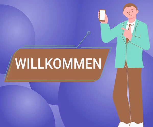 显示Willkommen的文字标牌 欢迎展示活动或你的家的文字 男人拿着手机屏幕展示未来技术 — 图库照片