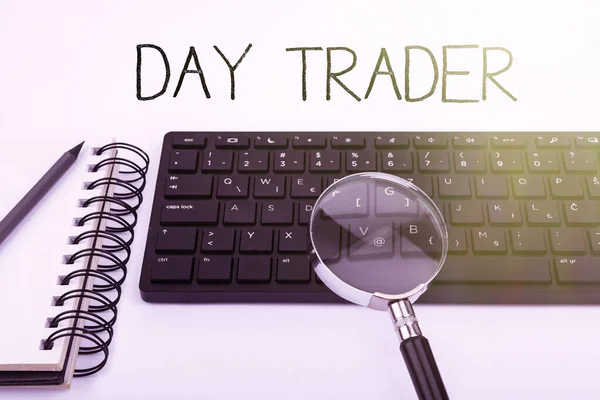 Hand writing sign Day Trader, Business concept A person that buy and sell financial instrument within the day Computer Keyboard And Symbol.Information Medium For Communication.