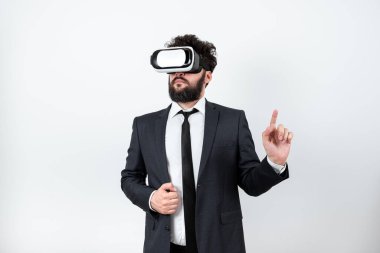 Man Wearing Vr Glasses And Pointing On Important Messages With One Finger.