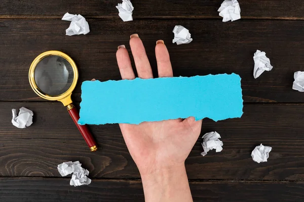 Hand Of Woman With Blank Sheet Representing Advertisement And Branding.