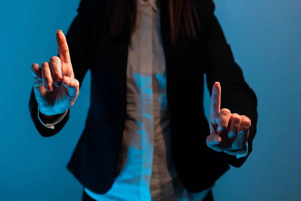 Businesswoman Pointing With Two Fingers On Important Messages.