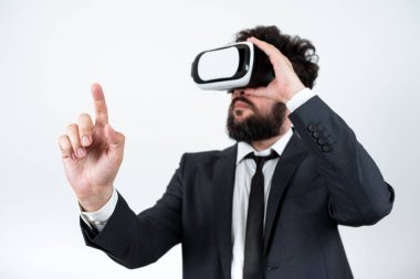 Man Wearing Vr Glasses And Pointing On Important Messages With One Finger.
