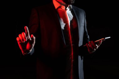 Man Holding Tablet And Pointing With One Finger On Important Message