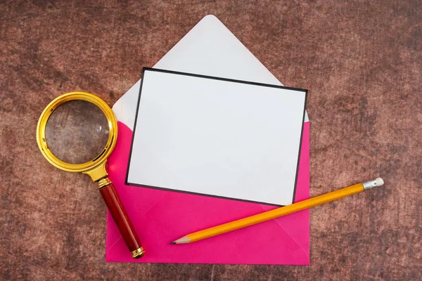 Letter With Envelope And Magnifying Glass Presenting Business Research.