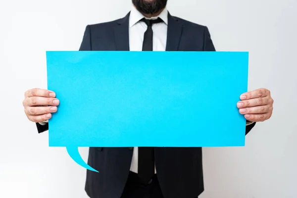 Businessman Holding Speech Bubble Important Informations — Φωτογραφία Αρχείου