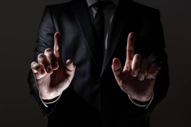 Businessman In Suit Pointing With Two Fingers On Important Message.
