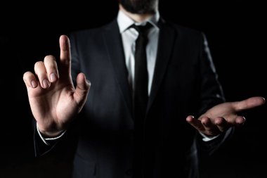 Man Pointing Ideas With One Finger And Presenting News With Other Hand.