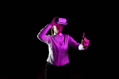 Woman Using Virtual Reality Simulator And Gesturing During Training.