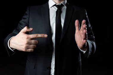 Businessman Pointing Important Infortmations With One Finger.