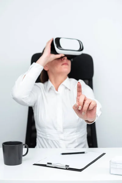 Woman Gesturing While Learning Skill Through Virtual Reality Simulator.