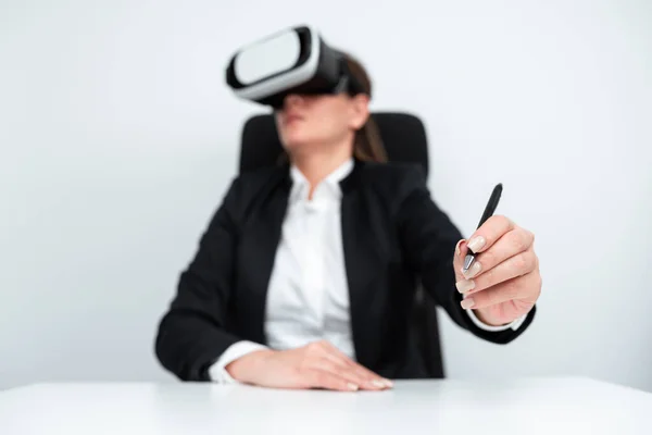 Businesswoman Wearing Virtual Reality Simulator Holding Pen Desk — Photo