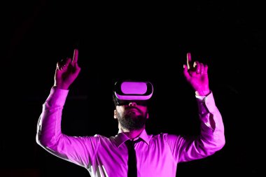 Businessman Using Virtual Reality Simulator And Gesturing During Training.