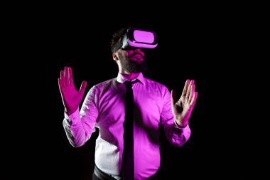 Businessman Wearing Virtual Reality Headset And Enjoying The Simulator.