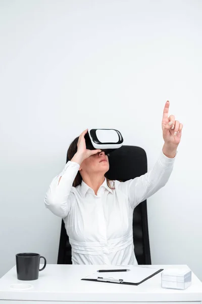 Woman Gesturing While Learning Skill Through Virtual Reality Simulator.