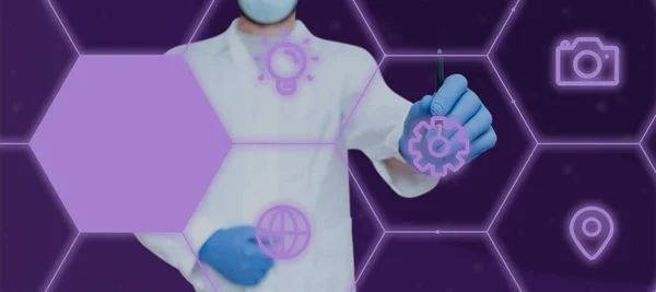 Doctor Pointing Pen On Digital S In Hexagon Showing Modern Technology.