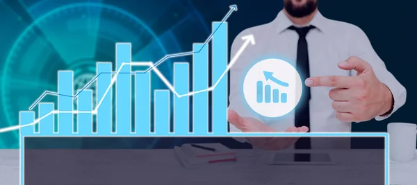 Businessman Pointing Chart Showing Crucial Diagrams Data — Stockfoto