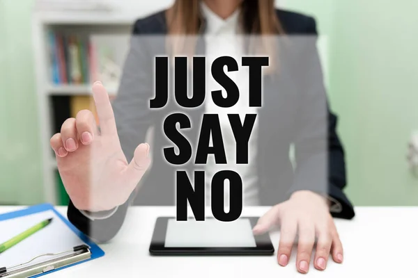 Handwriting text Just Say No, Concept meaning Do not be afraid of giving negative answers to some things Businesswoman Having Tablet On Desk And Pointing New Ideas With One Finger.