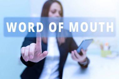 Sign displaying Word Of Mouth, Concept meaning Oral spreading of information Storytelling Viva Voice Woman Holding Tablet With One Hand And Pointing New Ideas With One Finger.