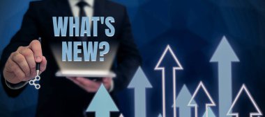 Conceptual caption What S Is New Question, Concept meaning Asking about latest Updates Trends Happening News Businessman in suit holding open palm symbolizing successful teamwork.