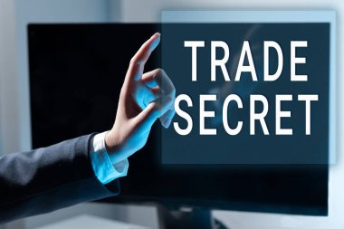 Sign displaying Trade Secret, Business approach Confidential information about a product Intellectual property Businesswoman Pointing With One Finger On Important Message.