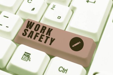 Text caption presenting Work Safety, Word Written on Policies and control in place according to government standard -48610