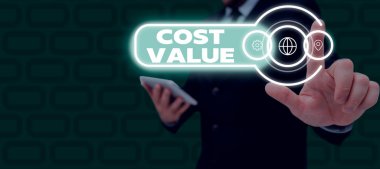 Inspiration showing sign Cost Value, Word for The amount that usualy paid for a item you buy or hiring a person Businessman in suit holding notepad symbolizing successful teamwork.