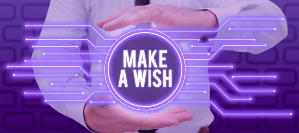 Conceptual display Make A Wish, Word Written on To have dreams desires about future events Be positive Man Having Futuristic Design In Hands And Presenting Crucial Information.