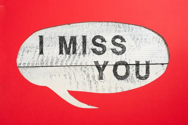 Text sign showing I Miss You, Business overview Feeling sad because you are not here anymore loving message Cropped Speech Bubble With Important Message Placed On Floor.