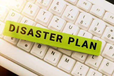 Hand writing sign Disaster Plan, Internet Concept Respond to Emergency Preparedness Survival and First Aid Kit -49195