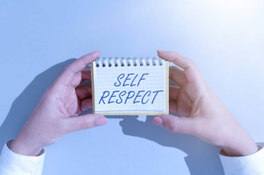 Text sign showing Self Respect, Word Written on Pride and confidence in oneself Stand up for yourself Businesswoman Holding Notepad With Important Message On Office Desk.