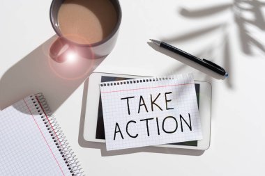 Text sign showing Take Action, Business overview Supporting what you say not just words but through evidence Late News Written On Note Over Tablet On Desk With Coffee, Pen And Notebook