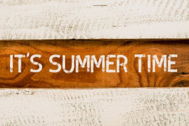 Hand writing sign It S Summer Time, Business idea Relax sunny hot season of the year Vacation beach trip Important Informations Written On Piece Of Wood On Floor.