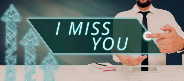 Text sign showing I Miss You, Concept meaning Feeling sad because you are not here anymore loving message Man With A Tablet Pressing On Digital Presenting Creative Ideas.