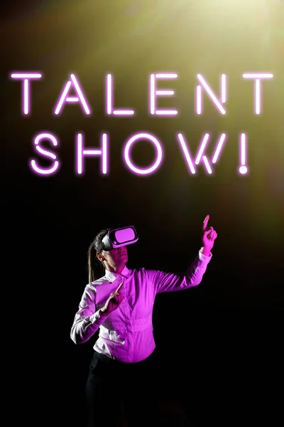 Text showing inspiration Talent Show, Business idea Competition of entertainers show casting their performances Woman Taking Professional Training Through Virtual Reality Goggles.