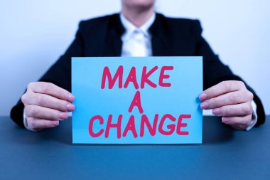 Text showing inspiration Make A Change, Business overview Try new thing Evolve Evolution Improvement Growth Mature Businesswoman Holding Note With Important Message On Office Desk.