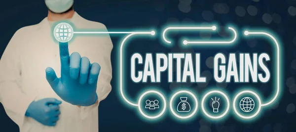 Inspiration showing sign Capital Gains, Internet Concept Bonds Shares Stocks Profit Income Tax Investment Funds Doctor Holding Pen And Presenting Crutial Ideas In Futuristic Frame.