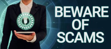 Inspiration showing sign Beware Of Scams, Concept meaning Stay alert to avoid fraud caution be always safe security Lady in suit holding pen symbolizing successful teamwork accomplishments.