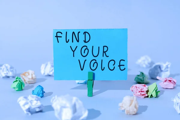 Inspiration showing sign Find Your Voice, Business idea Being able to express oneself as a writer to speak Important Message Presented On Piece Of Paper Clipped With Clip.