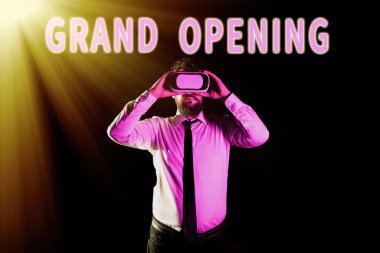 Inspiration showing sign Grand Opening, Word Written on Ribbon Cutting New Business First Official Day Launching Businessman Taking Professional Training Through Virtual Reality Goggles.