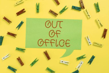 Conceptual caption Out Of Office, Business overview Outside the job Nobody in business Break Leisure Relax time Colorful Pegs Placed Around Speech Bubble With Important Information.