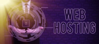 Hand writing sign Web Hosting, Business idea The activity of providing storage space and access for websites Businessman in suit holding open palm symbolizing successful teamwork.