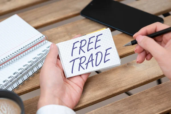 Conceptual display Free Trade, Business overview The ability to buy and sell on your own terms and means Businesswoman Holding Pen And Notepad With Important Message.