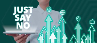 Conceptual caption Just Say No, Word for Do not be afraid of giving negative answers to some things Woman Holding Tablet And Presenting Digital Arrows With Business Data.