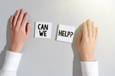Text showing inspiration Can We Help, Business showcase Offering assistance support expert advice for your problems Businesswoman Presenting Different Informations On Two Notes.