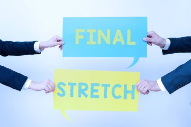 Writing displaying text Final Stretch, Word Written on Last Leg Concluding Round Ultimate Stage Finale Year ender Business Team Holding Two Important Ideas On Speech Bubbles On Both Sides.