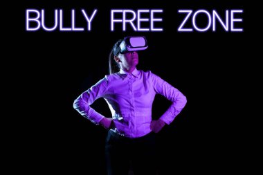Text caption presenting Bully Free Zone, Business concept Be respectful to other bullying is not allowed here Woman Taking Professional Training Through Virtual Reality Headset.