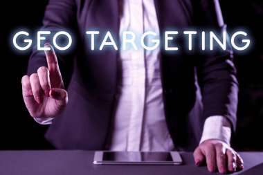 Writing displaying text Geo Targeting, Business overview Digital Ads Views IP Address Adwords Campaigns Location Businesswoman Having Tablet On Desk And Pointing New Ideas With One Finger.